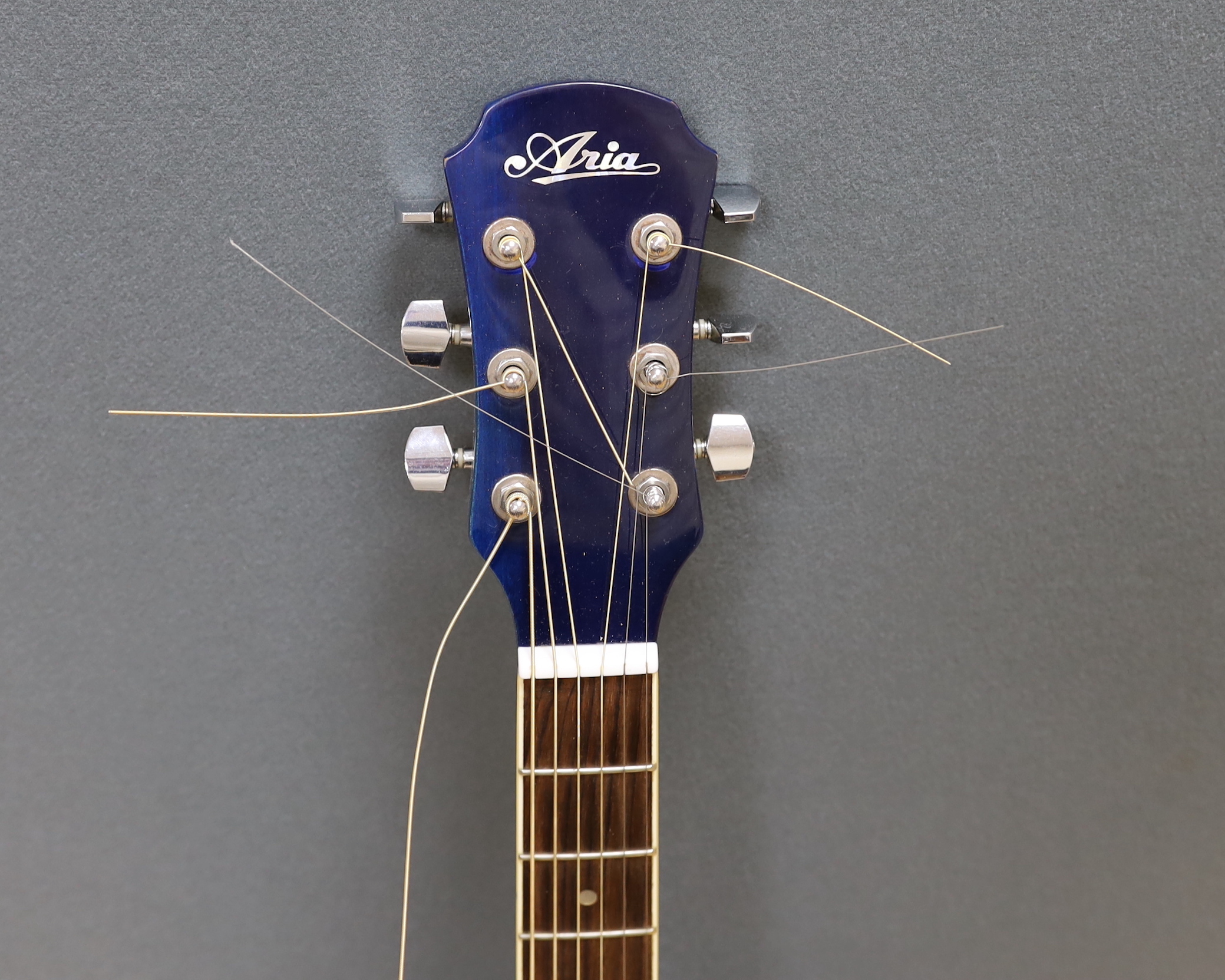 An Aria acoustic guitar, model no.AWN-15BLS